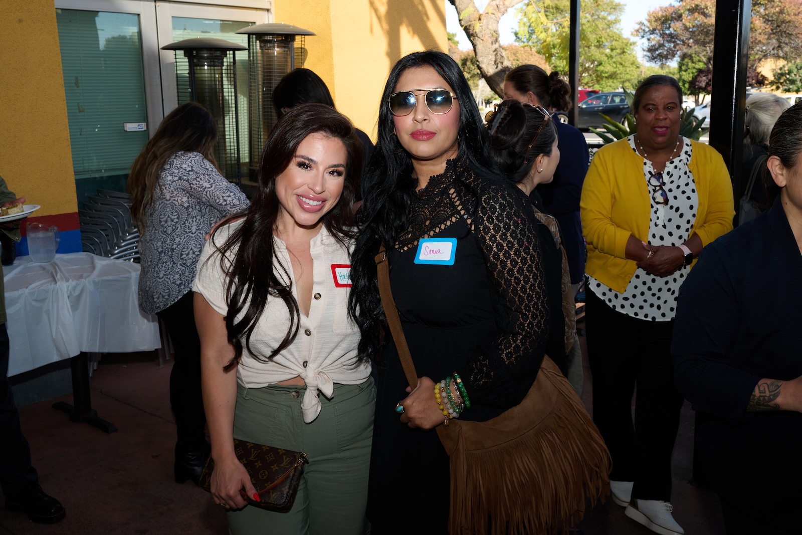 2 women posing at the May Mixer